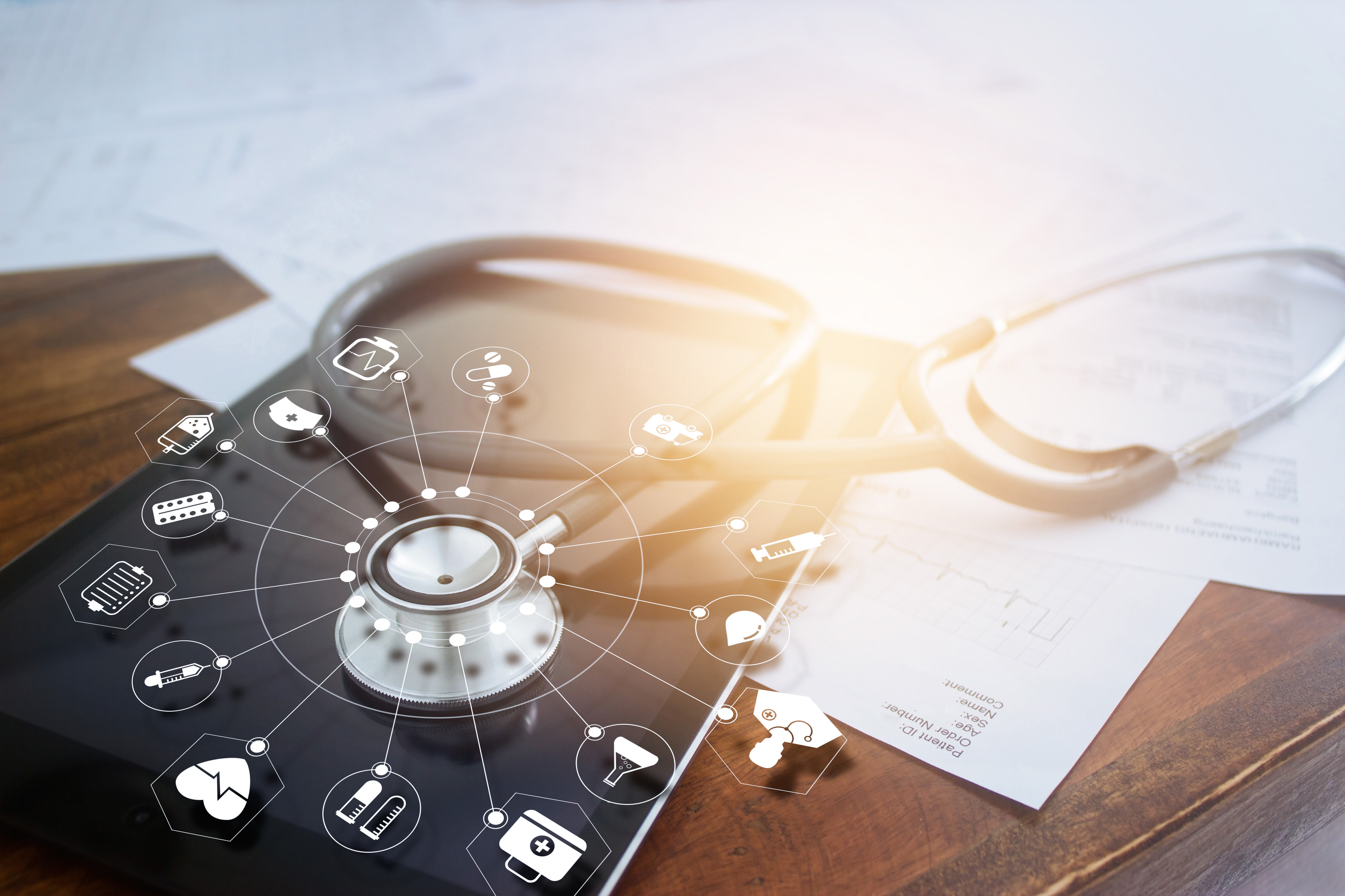 Telefon och stetoskop med hälsorelaterade ikoner som ska symbolisera innovation