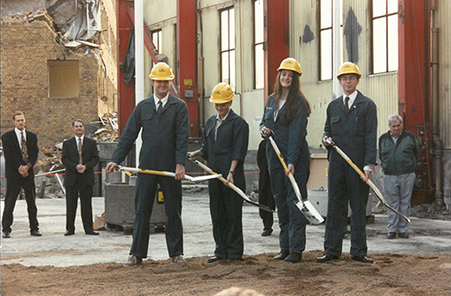 Students from each school dig the first shovel of earth in the construction of the new university campus
